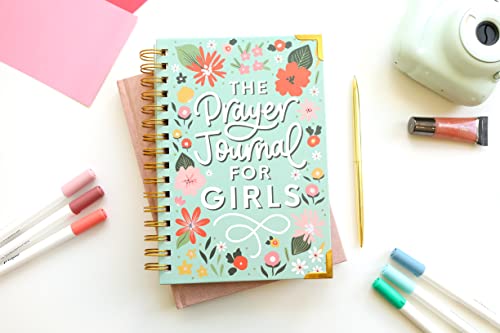 Flat lay of Prayer Journal for Teen Girls with floral cover, surrounded by pastel markers, gold pen, instant camera, and journaling accessories