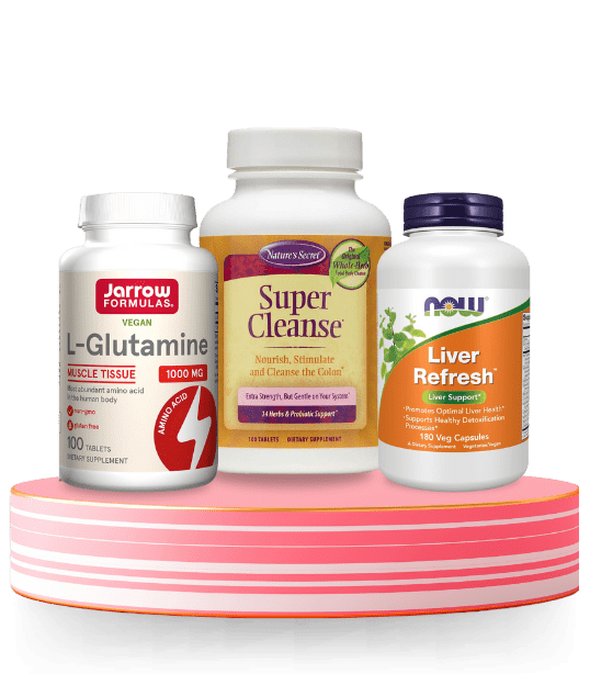 Liver Support Supplements – Detox, Cleanse & Wellness Trio Liver support supplements including NOW Liver Refresh, Nature’s Secret Super Cleanse, and Jarrow Formulas L-Glutamine on a pink-striped platform