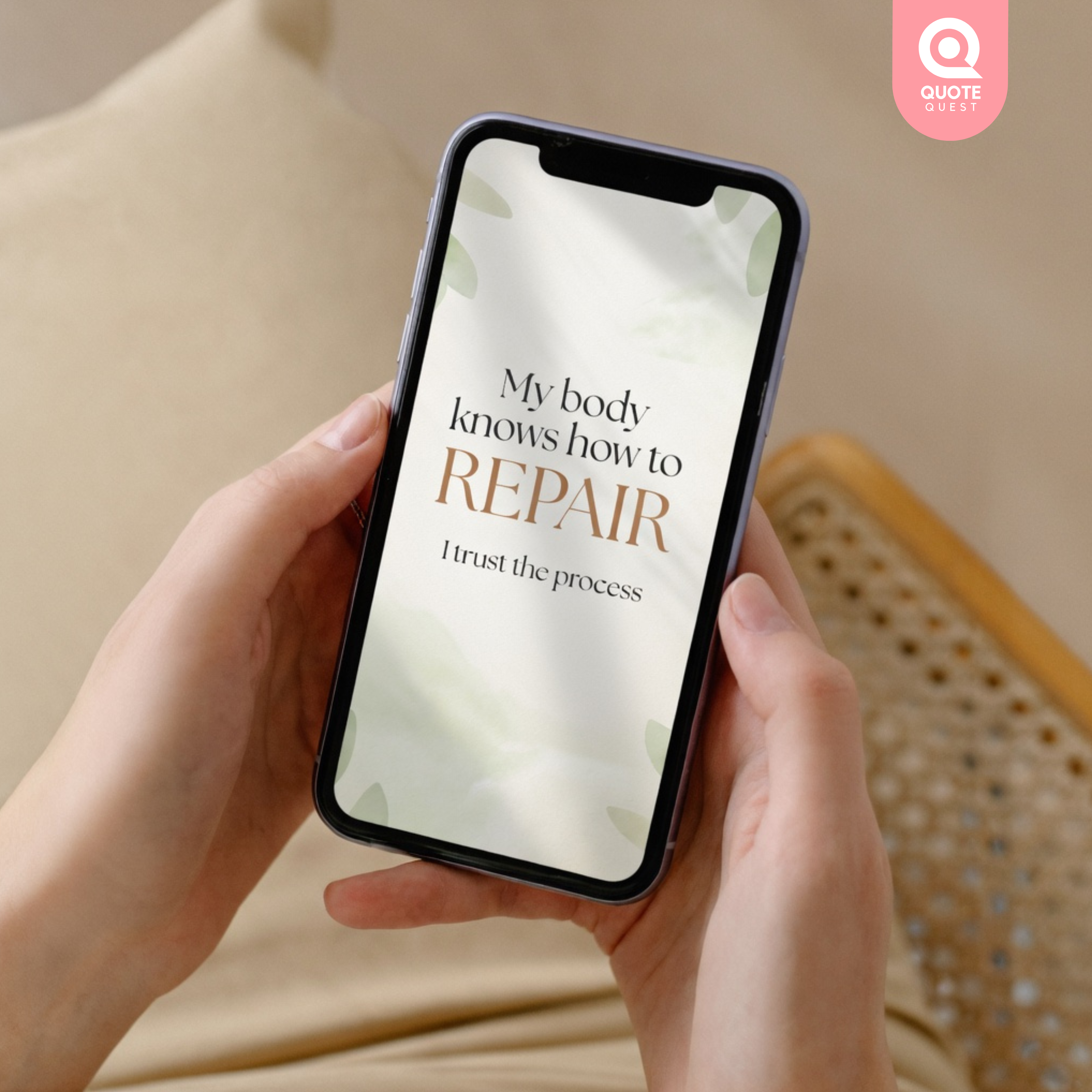 Shifa Mini Bundle: 52 Eczema Affirmation Cards 4 Person holding a smartphone displaying the affirmation" My body knows how to repair. I trust the process" on the screen, in a cozy neutral-toned setting.